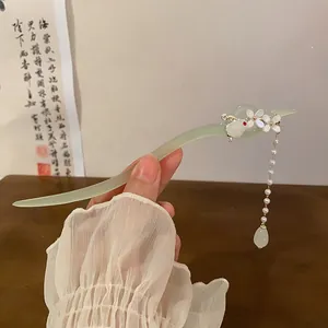 Elegant traditional Chinese style hair stick featuring rabbit motif and pearl tassel