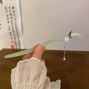 Elegant lily of the valley hair stick with delicate pearl tassel and green finish