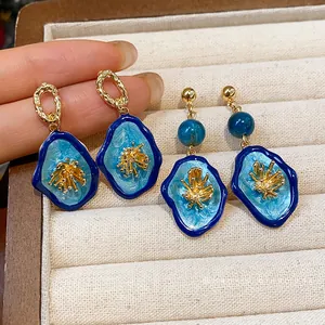 Exquisite blue enamel flower drop earrings with a vintage Chinese aesthetic design