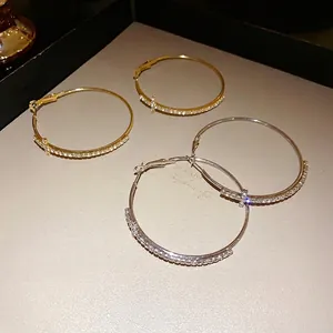 Minimalist silver needle cross hoop earrings with luxury sparkling crystal accents for women