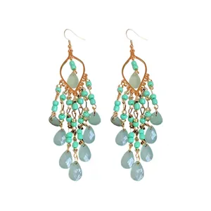 Bohemian chandelier earrings with green seed beads and acrylic waterdrop pendants