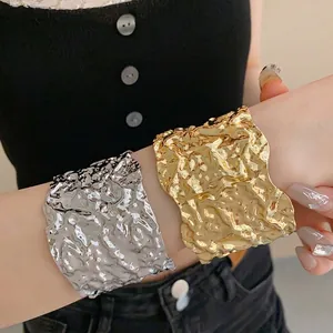 Fashionable metallic crumpled texture open cuff bangles in gold and silver finishes