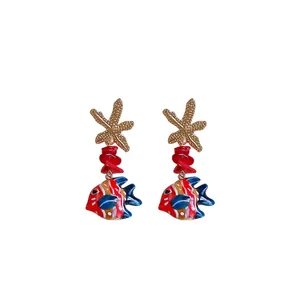 Stylish beach vacation style starfish and colorful glass fish dangle earrings for women