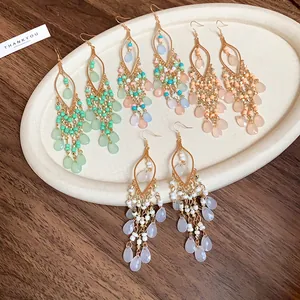 Detailed view of Bohemian teardrop earrings with colorful acrylic seed beads