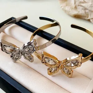 Elegant butterfly open bangle set with sparkling crystals in gold and silver finishes