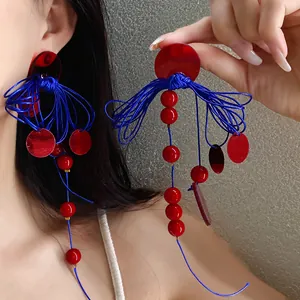 Elegant red and blue tassel bow earrings with silver needles for vintage vacation style