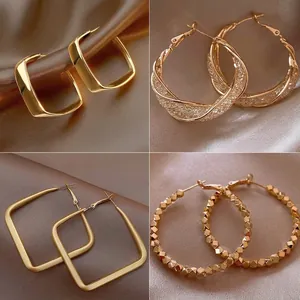 Set of elegant gold metal hoop earrings featuring various geometric and luxury designs