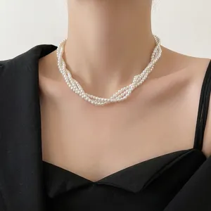 Elegant white multi-layered pearl choker necklace in vintage baroque style for women