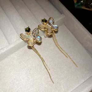 Exquisite 18K gold plated butterfly tassel ear clips with green zircon and shell inlay