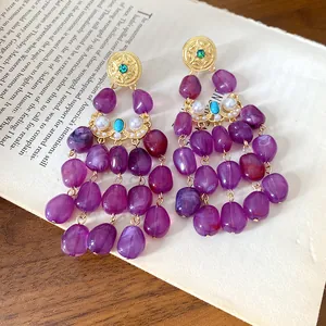 Vintage gold-tone drop earrings with elegant purple resin beads and pearl accents