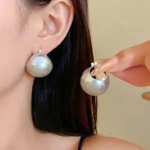 Stylish silver chunky geometric hoop earrings for women featuring a sleek matte finish