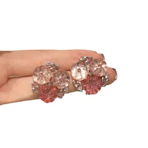 Boucles d'oreilles fleurs roses avec finition argentée pour femme
