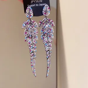 Detailed close-up view of multi-colored cubic zirconia leaf-shaped long dangle earrings.