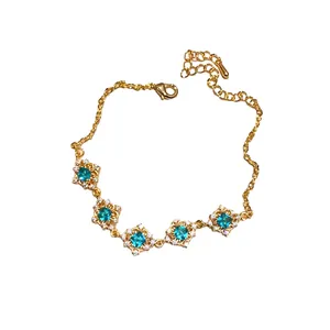 Elegant gold plated bracelet with blue zircon rhombus flower charms for stylish women