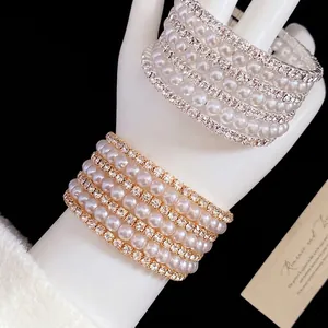 Elegant French retro multi-layer pearl and rhinestone wrap bracelet shown on a wrist