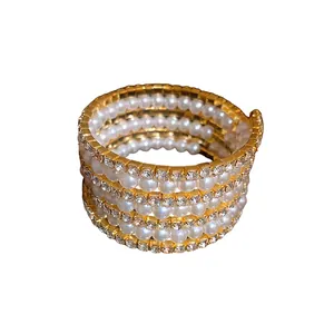 Elegant multi-layer pearl and rhinestone cuff bracelet in vintage gold finish