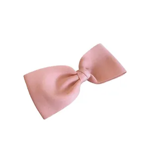Elegant pink fabric bow hair clip with minimalist duckbill design for women hair decor
