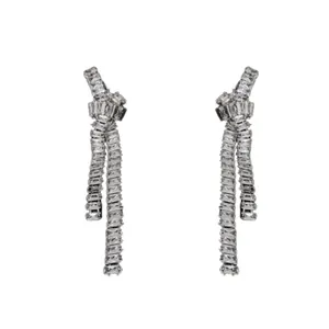 Elegant silver needle zircon tassel stud earrings featuring a chic knotted ribbon design