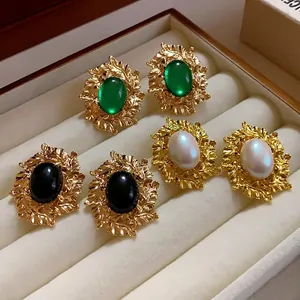 Elegant vintage gold leaf stud earrings with oval green black and pearl stones