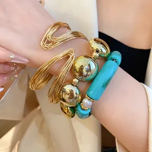 Chic layered gold metallic and teal acrylic pearl stretch bracelet set for women