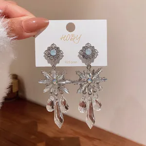 Exquisite crystal flower drop earrings featuring ornate 925 silver posts and dangling droplets