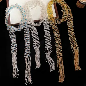 Elegant vintage glass beaded hollow-out long necklace featuring exquisite tassel details.