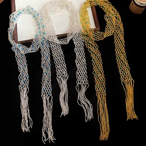 Detailed view of luxury vintage hollow-out glass beaded long necklaces with fringe