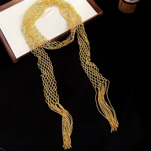 Elegant vintage gold beaded openwork long necklace with green accents for women.