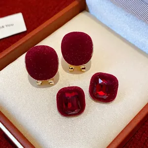 Elegant wine red flocked geometric earrings set with sparkling red crystals pins