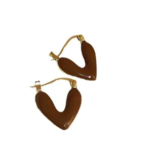 Chic coffee-colored heart-shaped hoop earrings with gold-tone accents for women