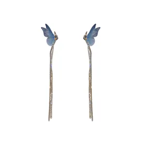 Elegant blue mesh butterfly wing earrings with long sparkling rhinestone tassels