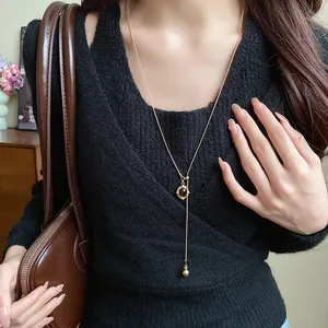 Vintage Maillard style oval resin pendant necklace with adjustable gold-tone chain