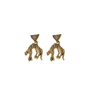 Vintage leopard panther earrings featuring triangular studs in an elegant gold finish