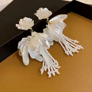 Elegant white floral petal tassel earrings with silver needles in sophisticated French style