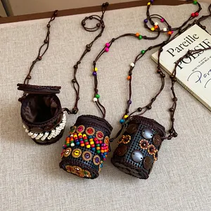 Handmade bohemian ethnic style coconut shell necklace pouches with colorful beads and cords