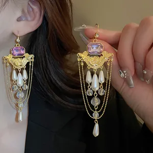 Elegant French vintage tassel earrings with purple gemstone and dangling white pearls