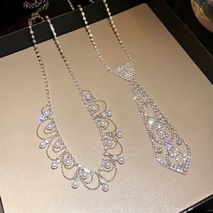 Elegant rhinestone tie necklace and pearl tassel set for women in vintage style.