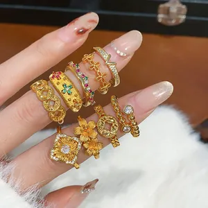 Set di anelli vintage placcati oro stile palazzo con dettagli floreali e zirconi