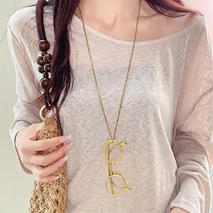 Elegant gold metal spectacle pendant necklace minimalist long sweater chain for daily wear