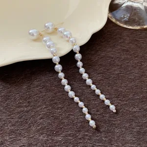 Elegant long pearl tassel drop earrings with silver needles in French retro style