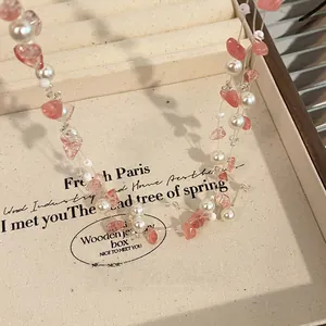 Detailed view of an exquisite pink strawberry quartz and pearl choker necklace for women