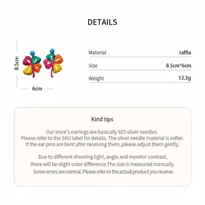 Detailed size and material specifications for colorful raffia woven flower earrings.