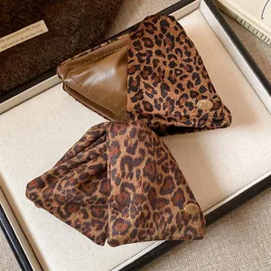 Large Maillard style leopard print triangle hair claw clip with elegant acrylic design
