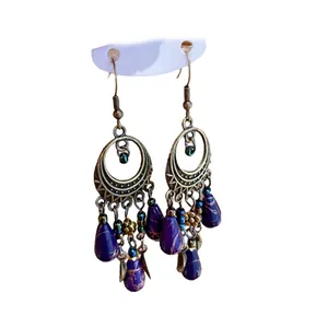 Orecchini vintage stile etnico con perle a goccia in marmo viola e cerchi in bronzo