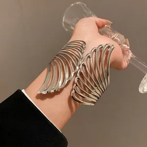 Elegant silver metal leaf cuff bracelet with stylish hollowed-out design for women