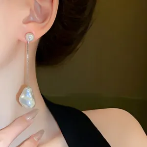 Elegant French style irregular baroque pearl earrings with silver snake chain tassel