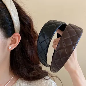 Elegant quilted faux leather headband for women featuring a vintage high-top design style