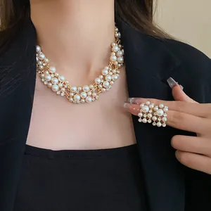 Elegant retro French style pearl and rhinestone necklace and ring jewelry set for women.
