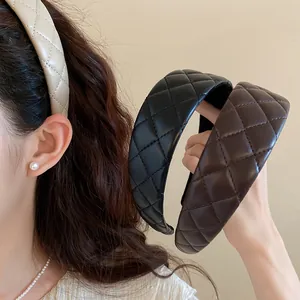 Chic vintage quilted leather padded headbands shown in beige black and brown colors