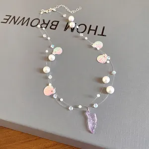 Double-layer pearl necklace with shell charms and purple wing pendant for beach vacation